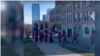 Screen capture from ABC affiliate WKRN-TV's YouTube page, showing the neo-Nazi group Blood Tribe marching in Nashville, Tennessee on February 18, 2024. 