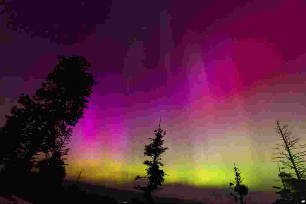 The northern lights fill the sky at the Bogus Basin ski resort in Boise, Idaho, May 11, 2024.