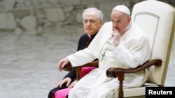 Pope Francis attends the weekly general audience in Paul VI hall at the Vatican, March 27, 2024. 
