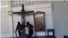 Screenshot of a video posted to X, which shows ISIS-affiliated militants destroying a Catholic Church in Marawi, Philippines in 2017. Some X users falsely claimed it was from Gaza. 