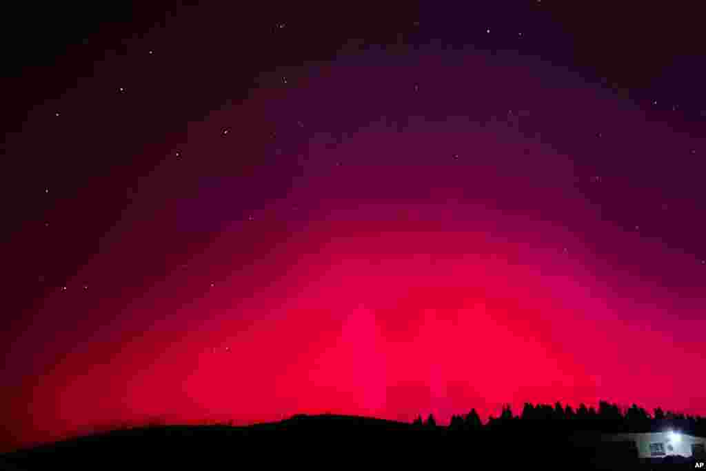 In this photo released by Xinhua News Agency, the northern lights are seen near Nanshan scenic spot in northwestern China's Xinjiang Uyghur Autonomous Region, May 11, 2024.