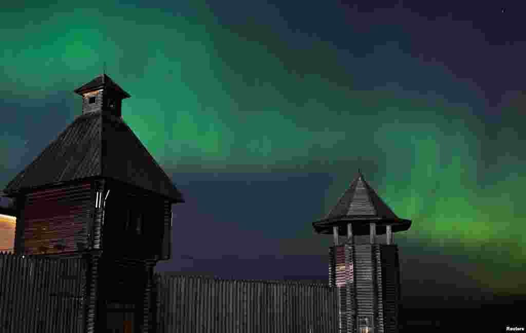 The aurora borealis illuminate the skies over the southwestern Siberian town of Tara, Omsk region, Russia, May 11, 2024. 