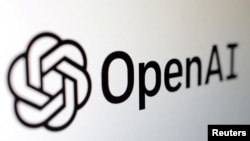 FILE — The OpenAI logo is featured in this illustration, Feb. 3, 2023. The U.S. Justice Department and the Federal Trade Commission are in discussions over which agency can probe OpenAI on antitrust grounds, Politico reported Friday.