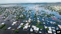 In this image made from video, flooded streets are seen from the air in the town of Beledweyne, Somalia, Nov. 19, 2023.
