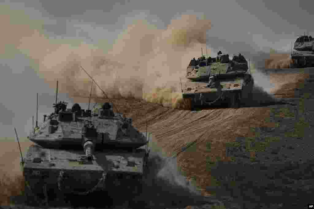 G&#39;azo chegarasi tomon ketayotgan Isroil tanklari