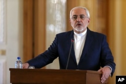 FILE - Iranian Foreign Minister Mohammad Javad Zarif speaks at a joint press conference with his French counterpart, in Tehran, Jan. 31, 2017.