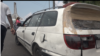 Un taxi informel, communément appelé "clando" en stationnement au rond point du carrefour Rio, à Libreville, au Gabon, le 23 mai 2022. 