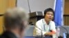 FILE - Ji Seong-ho, a North Korean defector, speaks as Michael Kirby, left, chairman of the U.N. Commission of Inquiry on Human Rights in North Korea, listens during a public hearing at Yonsei University in Seoul, Aug. 22, 2013. 