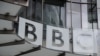 FILE - Signage is seen at BBC offices and recording studios, in London, May 21, 2021.