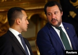 FILE PHOTO: Interior Minister Matteo Salvini talks with Italy's Minister of Labor and Industry Luigi Di Maio at the Quirinal palace in Rome, Italy, June 1, 2018.
