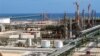 FILE - Oil and gas installations are found throughout Libya. This one, built by the Italian ENI group, is on the coast near Mellitah, Libya.