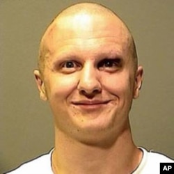 Jared Lee Loughner, the suspect in the attempted assassination of US Representative Gabrielle Giffords, is shown in this Pima County Sheriff's Forensic Unit handout photograph released, 10 Jan 2011