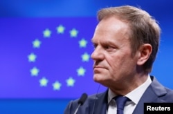 European Council President Donald Tusk looks at Armenia's President Serzh Sargsyan after a meeting in Brussels, Belgium, Feb. 27, 2017.