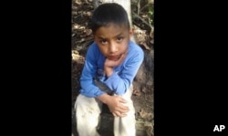 Catarina Gomez provided this photo of her half-brother Felipe Gomez Alonzo, 8, near her home in Yalambojoch, Guatemala, Dec. 12, 2018. The 8-year-old boy died in U.S. custody at a New Mexico hospital on Christmas Eve after suffering a cough, vomiting and fever, authorities said.