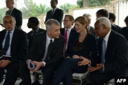 FILE - U.S. ambassador to the United Nations Samantha Power, second right, speaks with other U.N. Security Council ambassadors during a meeting with the Burundian president at his residence outside Bujumbura, Jan. 22, 2016.