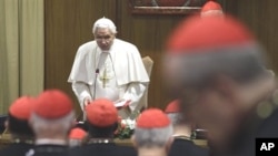 Pope Benedict XVI delivers his message to cardinals at the Vatican, 19 Nov 2010