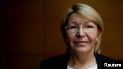 FILE - Venezuela's dismissed chief prosecutor Luisa Ortega Diaz poses for a picture during an interview with Reuters in Caracas, Aug. 10, 2017.