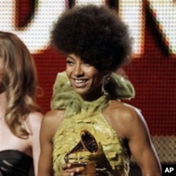Esperanza holds the Grammy Award for Best New Artist