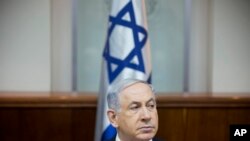 Israeli Prime Minister Benjamin Netanyahu attends a weekly cabinet meeting in Jerusalem, Jan. 4, 2015.