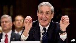 Then FBI Director Robert Mueller testifies on Capitol Hill in Washington, June 19, 2013, before the Senate Judiciary Committee.