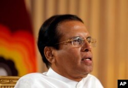 Sri Lankan President Maithripala Sirisena speaks during an interview with the Associated Press at his residence in Colombo, Sri Lanka, Tuesday, May 7, 2019.