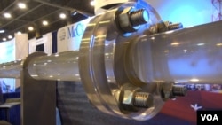 A McCrometer Corp. pipe model demonstrates flow regulation. (G. Flakus/VOA)