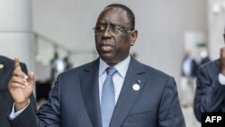 Macky Sall fait face aux incitations d'importants partenaires internationaux, de l'opposition et de la société civile à renoncer au report de l'élection présidentielle.