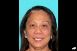 This undated photo provided by the Las Vegas Metropolitan Police Department shows Marilou Danley. Danley, 62, returned to the United States from the Philippines on Oct. 3, 2017, and was met at Los Angeles International Airport by FBI agents, according to