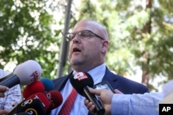 U.S. Charge d'Affaires Jeffrey Hovenier talks to members of the media after visiting US pastor Andrew Brunson, who is being held under house arrest in Izmir, Turkey, Aug. 14, 2018.