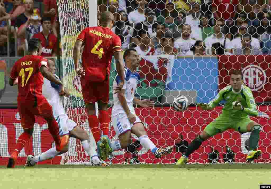 Belgium's Divock Origi scores against Russia during their match at the Maracana stadium in Rio de Janeiro, June 22, 2014.