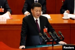 Chinese President Xi Jinping speaks at the closing session of the National People's Congress (NPC) at the Great Hall of the People in Beijing, China, March 20, 2018.