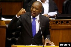FILE - Opposition Democratic Alliance (DA) party leader Mmusi Maimane speaks in parliament in Cape Town, South Africa, Aug. 8, 2017.