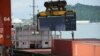 FILE - Shipping containers are seen on a cargo vessel at the Dachan Bay Terminals in Shenzhen, Guangdong province, China, July 12, 2018.