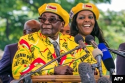 ប្រធានាធិបតី​ស៊ីមបាវ៉េ លោក Robert Mugabe។