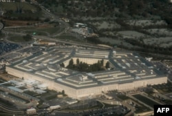 FILE - The Pentagon, headquarters of the U.S. Department of Defense, in Arlington, Virginia, outside Washington, D.C., is seen in an aerial photograph, April 23, 2015.