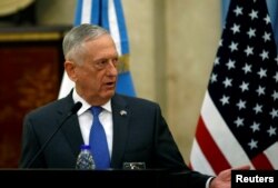 FILE - U.S. Secretary of Defense James Mattis attends a news conference at Libertador Building in Buenos Aires, Argentina, Aug. 15, 2018.