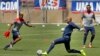 U.S. goalie Tim Howard works out with teammates during training for the World Cup soccer tournament.
