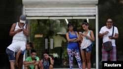 Cubans use the internet via public Wi-Fi in Havana, Cuba, Sept. 5, 2016. By the end of the year, Cuba promises to bring the internet to homes in Old Havana.