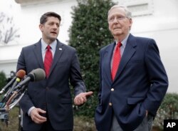 FILE - House Speaker Paul Ryan of Wisconsin, right, and Senate Majority Leader Mitch McConnell of Kentucky meet with reporters outside the White House in Washington after meeting with President Donald Trump.