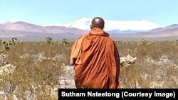 Buddhist monk Sutham Nateetong is walking across the USA to promote peace