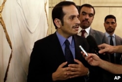 FILE - Qatar's foreign minister, Sheikh Mohammed bin Abdulrahman Al Thani, talks to journalists in Rome, July 1, 2017.