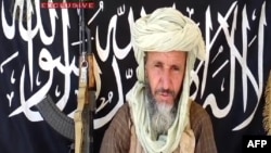 This image released on December 25, 2012 by Sahara Media, shows one of the leaders of Al-Qaida in the Islamic Maghreb (AQIM), Abdelhamid Abou Zeid in an undisclosed place.
