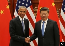 President Barack Obama and Chinese President Xi Jinping shake hands at the West Lake State Guest House in Hangzhou, China, Sept. 3, 2016, on the sidelines of the G-20 summit.