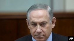 Israeli Prime Minister Benjamin Netanyahu chairs the weekly Cabinet meeting, in Jerusalem, Feb. 19, 2017. 