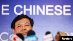 China Vice Finance Minister talks to the media in Los Cabos, Mexico, June 17, 2012.
