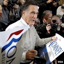 Mitt Romney, saat melakukan kampanye di Clive, Iowa (2/1). Romney memenangkan kaukus Iowa dengan selisih hanya 8 suara atas Rick Santorum yang berada di tempat kedua.