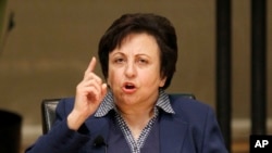 FILE -- Shirin Ebadi participates in the World Summit of Nobel Peace Laureates, April 25, 2012, in Chicago. On Wednesday, Ebadi urged Iranians to press on with their nationwide protests.