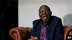 Zimbabwe opposition leader Morgan Tsvangirai speaks to the Associated Press after giving a press conference at his home in Harare, Zimbabwe Thursday, Nov. 16, 2017.