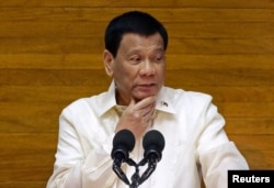 Philippine President Rodrigo Duterte delivers his State of the Nation address at the House of Representatives in Quezon city, Metro Manila, Philippines July 23, 2018.