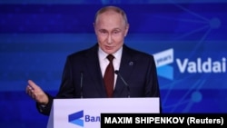 Russian President Vladimir Putin delivers a speech at the 21st annual meeting of the Valdai Discussion Club in Sochi, Krasnodar region, Russia, Nov. 07, 2024.